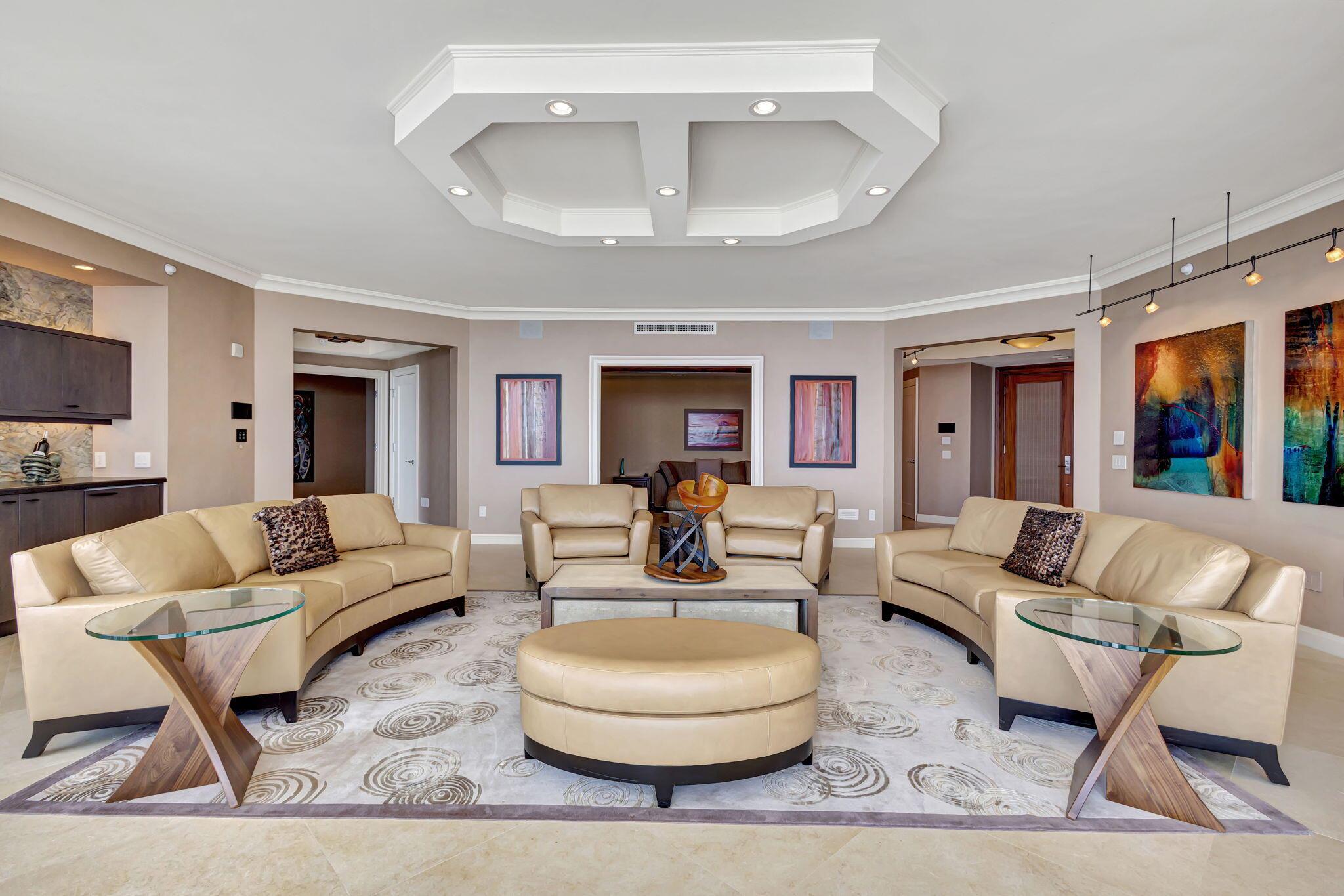 A TURN-KEY GEM. *DESIGNER DECORATED WITH FINE LEATHER, SOPHISTICATED TEXTILES, MODERN ART WORK, AND TOUCH SCREEN TECHNOLOGY !*UNOBSTRUCTED VIEWS OF BOTH OCEAN AND INTRA-COASTAL*A MASTER SUITE WITH HUGE WALKIN CLOSET, & DOUBLE VANITIES*GAS COOKING RANGE IN A GOURMET KITCHEN WITH CUSTOM CABINETRY AND HIGH-END APPLIANCESRITZ CARLTON RESIDENCE OFFERS TWO POOLS, DIRECT BEACH ACCESS, POOLSIDE CAFE, FABULOUS FITNESS CENTER, VALET PARKING, AND 24 HOUR CONCIERGE SERVICE.