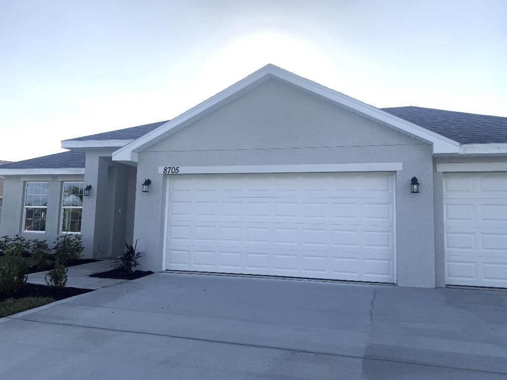 Photo of 8705 Pavia Street NW, Fort Pierce, FL 34951 (MLS # R10966171)