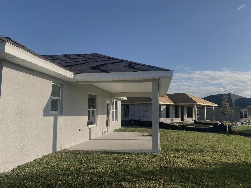 Photo of 8705 Pavia Street NW, Fort Pierce, FL 34951 (MLS # R10966171)