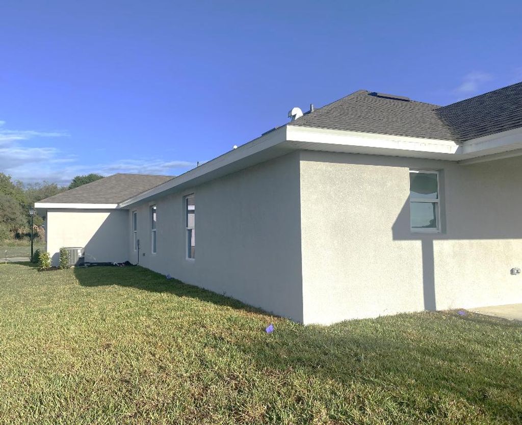 Photo of 8705 Pavia Street NW, Fort Pierce, FL 34951 (MLS # R10966171)