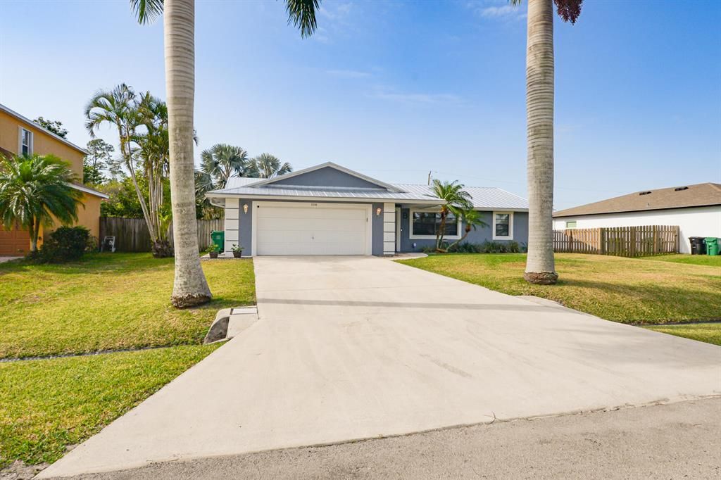 Photo of 1518 SW Fresno Road SW, Port St Lucie, FL 34953 (MLS # R10878229)
