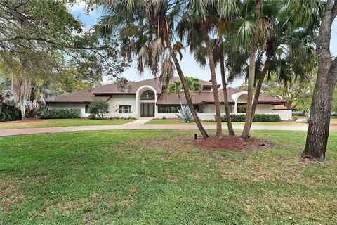 Photo of 7011 Hialeah Lane, Parkland, FL 33067 (MLS # F10555941)