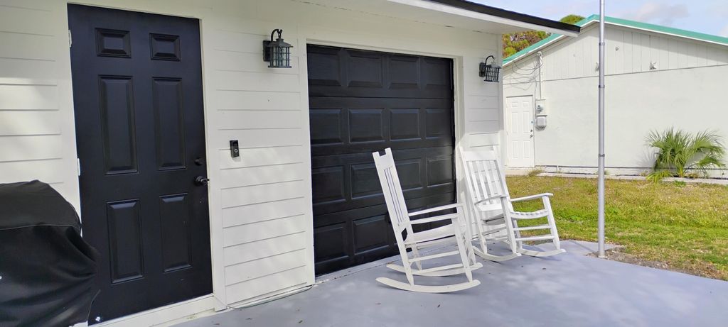 Photo of 1562 SW Curry Street, Port Saint Lucie, FL 34983 (MLS # R11063621)