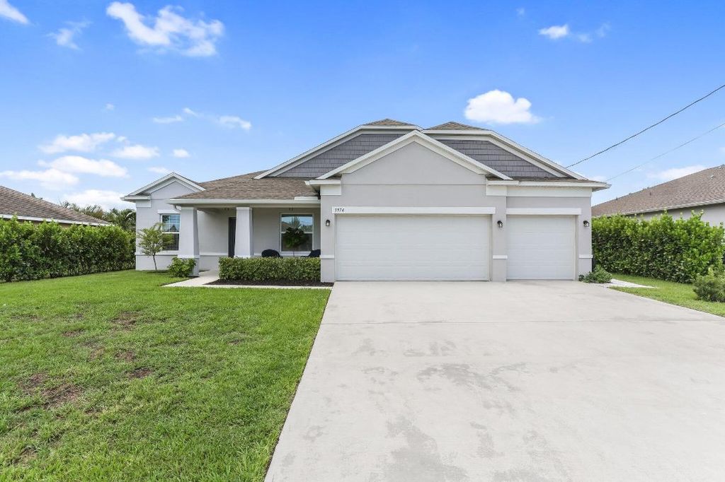 Photo of 3974 SW Jarmer Road, Port Saint Lucie, FL 34953 (MLS # R11094633)