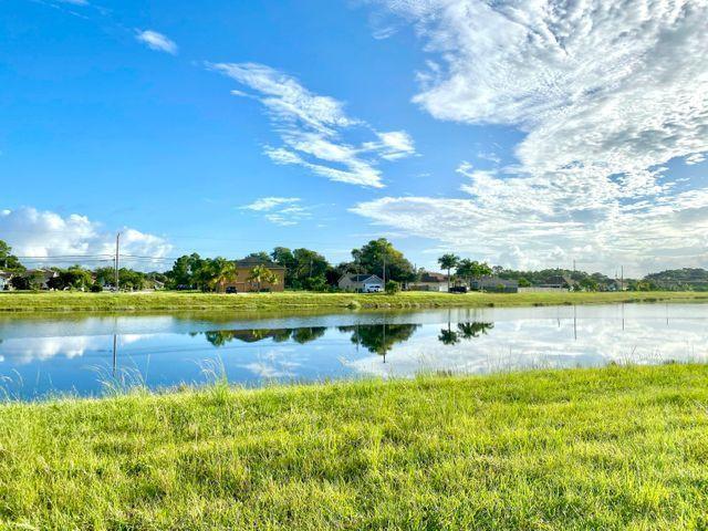 Beautiful Area! Wide lot located in front of a Pond. Close to St Lucie West and Tradition.