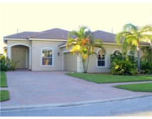 THIS 4 BEDROOM HOMW IS CHARMING AND HAS A LARGE BACKYARD. IT HAS A SPLIT FLOOR PLAN ALONG WITH A LARGE MASTER SUITE. LOCATED IN THE HEART OF ROYAL PALM BEACH