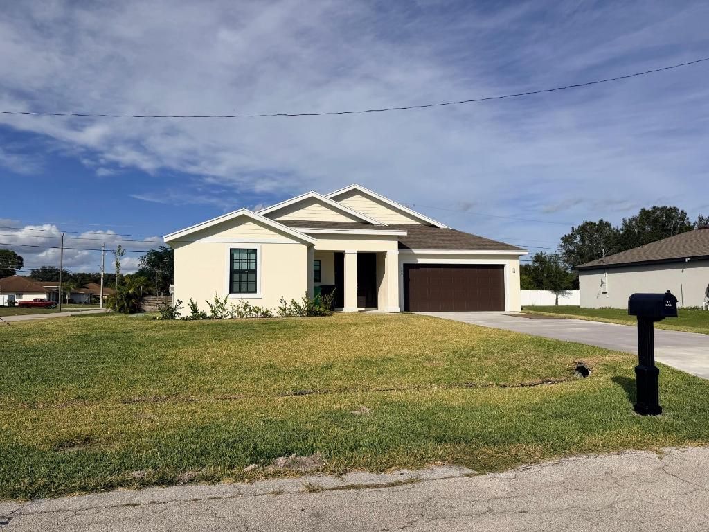 Photo of 499 SW Dailey Avenue, Port Saint Lucie, FL 34953 (MLS # R11152074)
