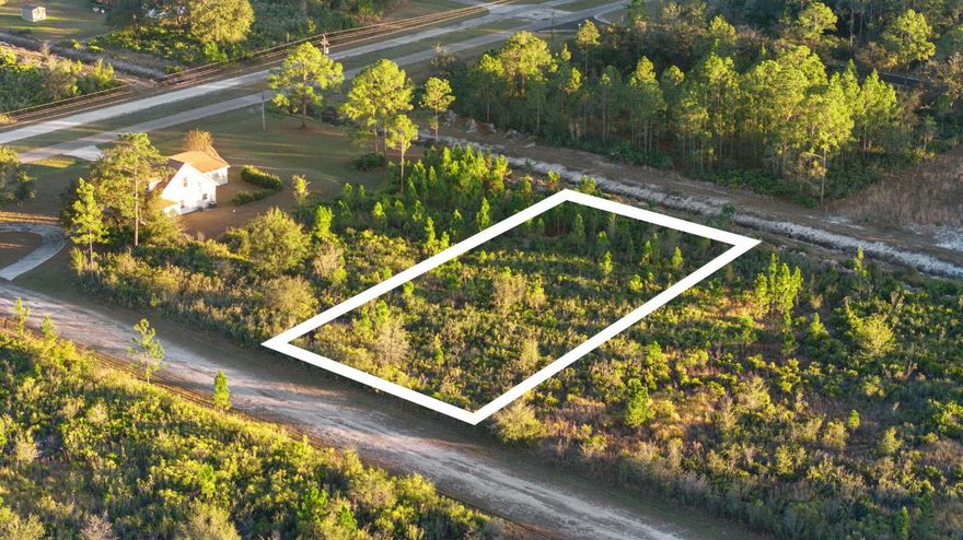 0.50-acre vacant lot in Indian Lake Estates with land use designated for single-family residential only. This property offers a quiet rural setting with north-facing frontage on a private road and a greenbelt to the rear for added privacy. Water and electric are available to the property. Convenient access to SR-60 allows easy travel to Lake Wales, Frostproof, and central Florida. Ideal for a future homesite or long-term investment. Community fees are modest (buyer to verify). Buyer to verify zoning, land use, utilities, and building requirements with Polk County.