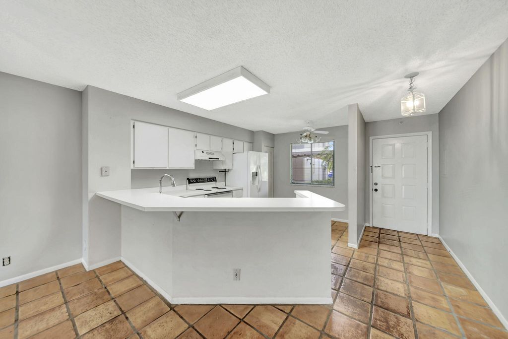 Photo of 2215 Cypress Island Drive #103, Pompano Beach, FL 33069 (MLS # B26012735)