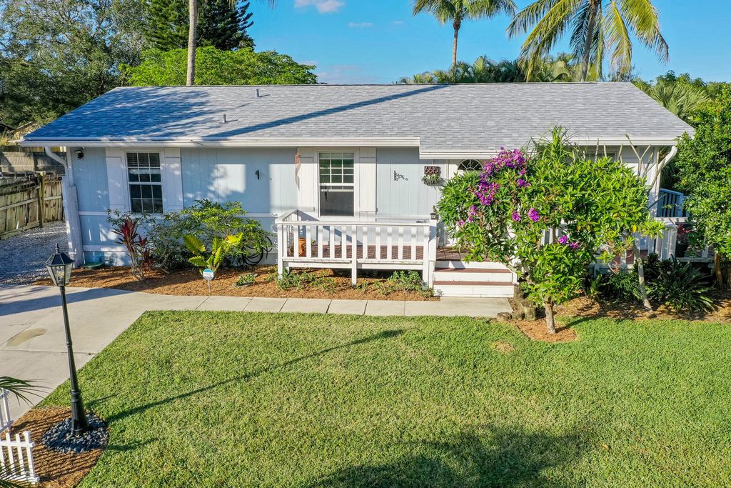 Photo of 6615 Jupiter Gardens Boulevard, Jupiter, FL 33458 (MLS # R10860393)