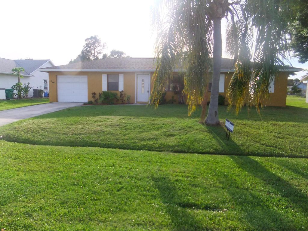 Photo of 1174 SW Hutchins Street, Port St Lucie, FL 34983 (MLS # R10910590)