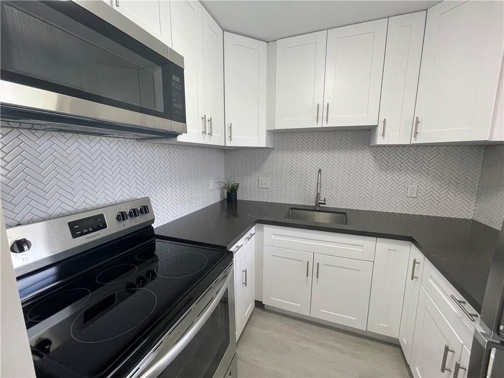 Photo of 3930 Crystal Lake Drive #315, Pompano Beach, FL 33064 (MLS # F10556212)