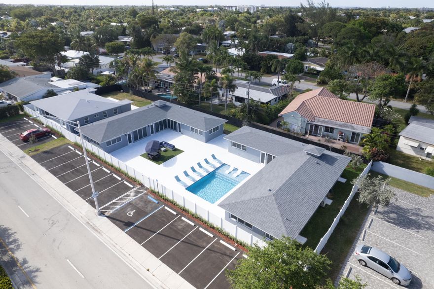 Thriving Airbnb Multi Family Compound in Wilton Manors. The portfolio consists of three consecutive buildings across three separate folios (Additional Folios listed on supplement remarks), on an expansive ±21,000 sqft for a total offering price of $3,900,000. Unit count: 6 one-bedroom units, 2 studios, and 2 efficiencies, offering a highly desirable rental profile. All units are turn key and fully operational, resulting in a stabilized asset with immediate cash flow. Over $1M in renovations: new roof, electrical, plumbing, impact windows, plus a gorgeous Resort-style pool and 20-spot parking. Strategically positioned on a high-demand corridor, its proximity to Lauderdale Beach, Las Olas, Wilton Drive and International Airports supports a strong year-round demand and repeat bookings.