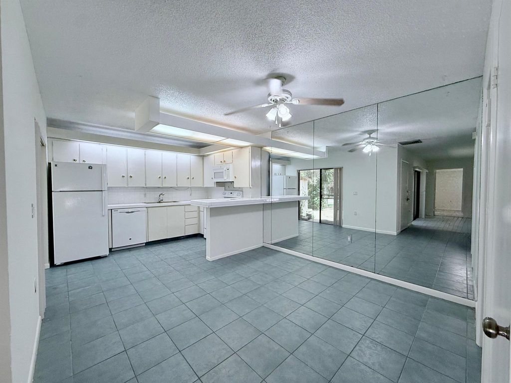 Photo of 710 7th Lane, Palm Beach Gardens, FL 33418 (MLS # R11113276)