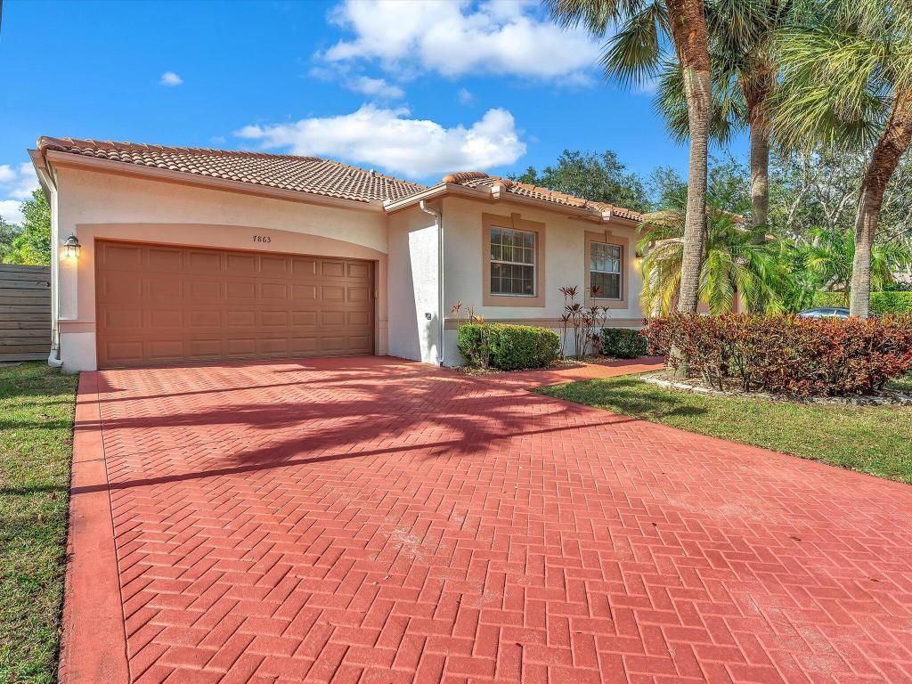 Photo of 7863 NW 61st Terrace, Parkland, FL 33067 (MLS # R11153013)