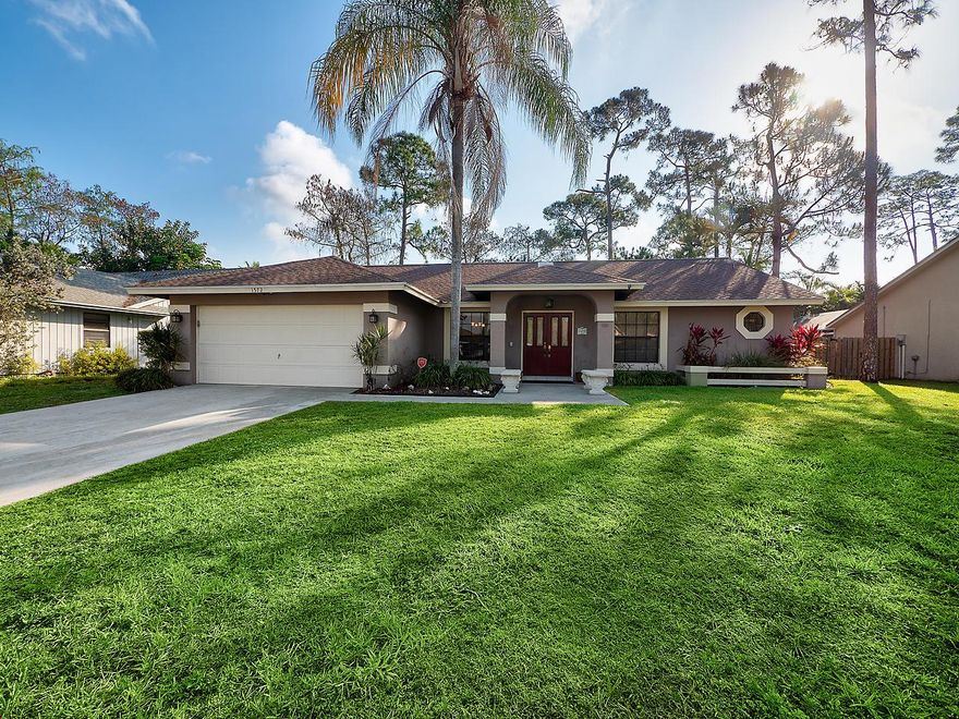 Just a short golf cart ride to the showgrounds, right in the heart of Wellington, this 4 bedroom, 2 bath home has the perfect open floor plan  to suite anyone's needs. Upon entering you're greeted by so much natural light and a view of the private fenced backyard. Updated kitchen with stainless steel  appliances and granite counter tops. Split floor plan with the master bedroom and office (4th bedroom) on one side of the home. A tastefully remodeled master bathroom. While on the other end of the home you'll find two well sized bedrooms, the laundry room and remodeled cabana bath. Over-sized 2 car garage, fully fenced and landscaped backyard on a quiet street near parks and cut through Appaloosa to the showgrounds.