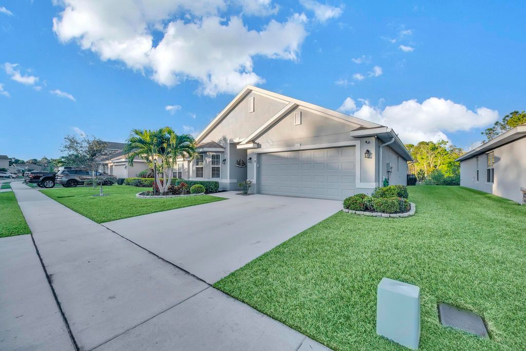 Photo of 879 NE Whistling Duck Way, Port Saint Lucie, FL 34983 (MLS # R10961833)