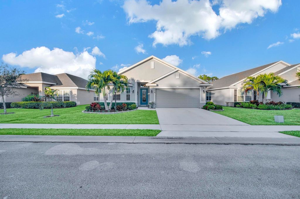 Photo of 879 NE Whistling Duck Way, Port Saint Lucie, FL 34983 (MLS # R10961833)