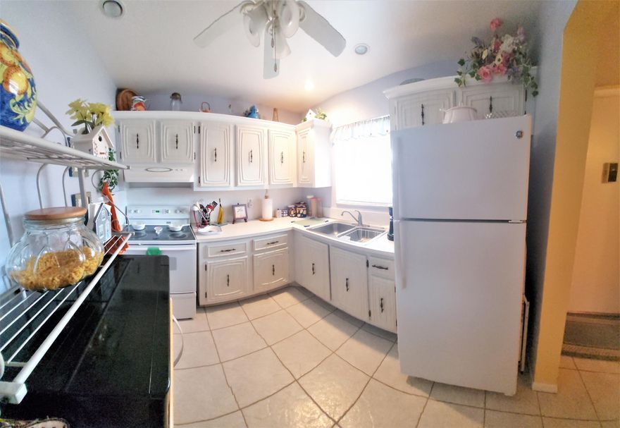 Minutes to the beach,restaurants,shopping,airport. This Beautiful 1 bedroom 1.5 bath, condo on 1st floor is minutes away from restaurants, beaches, shopping and PBA airport.  Parking spot is steps away from the front door  Tastefully decorated colors through out the condo Large lanai  with serene garden views, .partial impact glass. Recreation Center with 2 pools,fitness center,bocce,mini-putt & shuffleboard,large Clubhouse auditorium with events. Lakeside Village is 55plus community with many amenities to enjoy. At least one occupant must be 55+