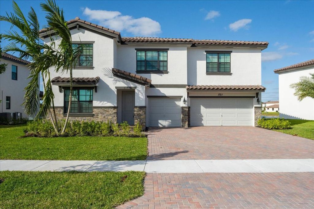 Photo of 1321 Whitcombe Drive, Royal Palm Beach, FL 33411 (MLS # R11119867)