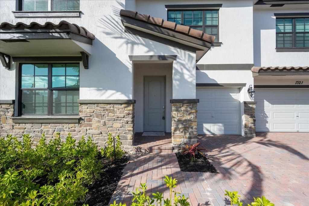 Photo of 1321 Whitcombe Drive, Royal Palm Beach, FL 33411 (MLS # R11119867)