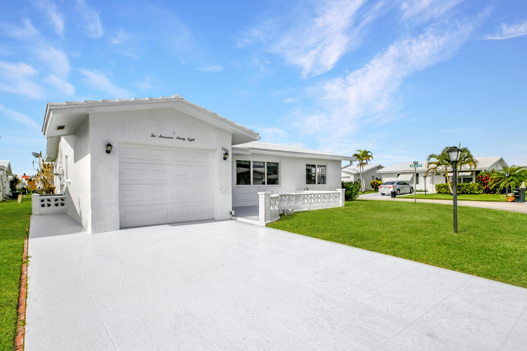 WOW--This Is the One! Step into this stunning fully renovated 3-bed, 2-bath corner home featuring a new roof, new impact windows, brand-new bathrooms, modern lighting, updated appliances, and fresh interior/exterior paint throughout. Every detail has been thoughtfully upgraded so you can move in with ease and style.Located just a short walk to one of three community clubhouses with pools, you'll love living in this active 55+ neighborhood. But here's the best part--FREE GOLF is included at the community's private 18-hole course!Enjoy this bright, modern makeover and soak up the worry-free Florida lifestyle you've been dreaming of.Call today--this one won't last!
