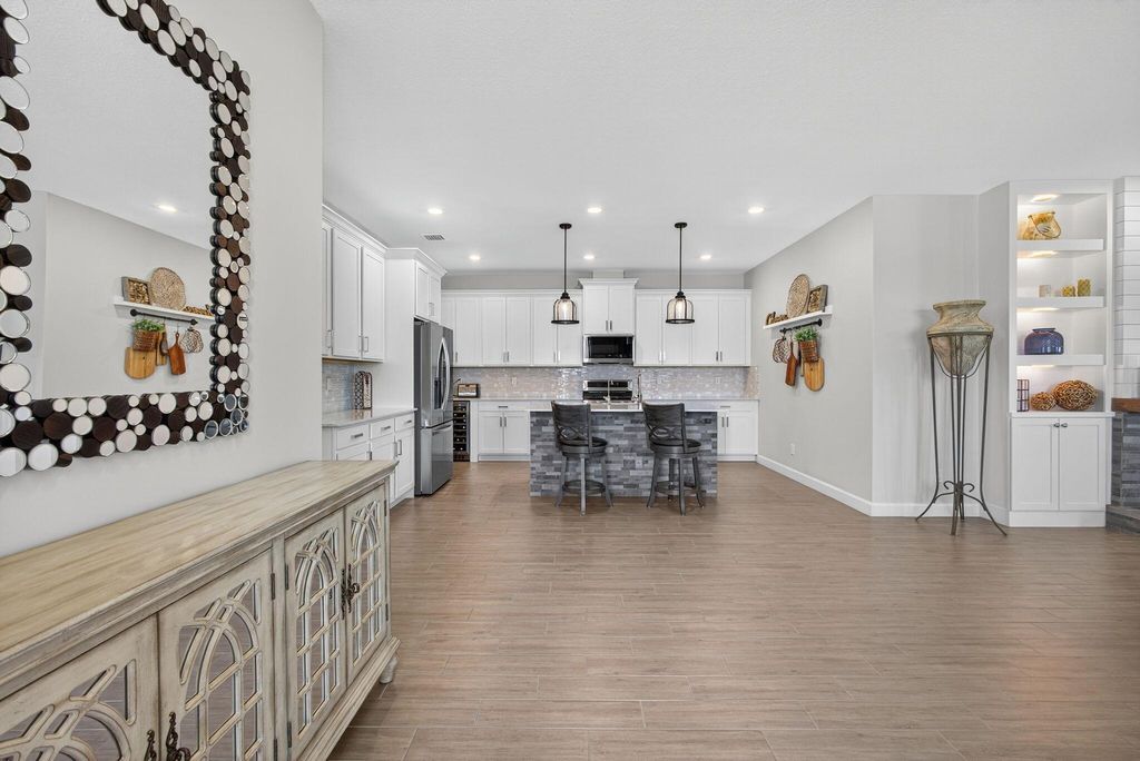 Photo of 1220 Haywagon Trail, The Acreage, FL 33470 (MLS # R11116802)