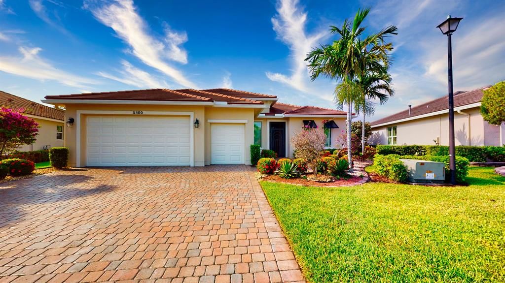 Photo of 11500 SW Apple Blossom Trail, Port St Lucie, FL 34987 (MLS # R10885683)