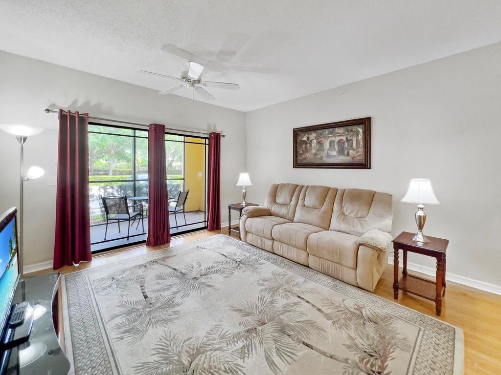 Photo of 3018 Alcazar Place #104, Palm Beach Gardens, FL 33410 (MLS # R10974126)