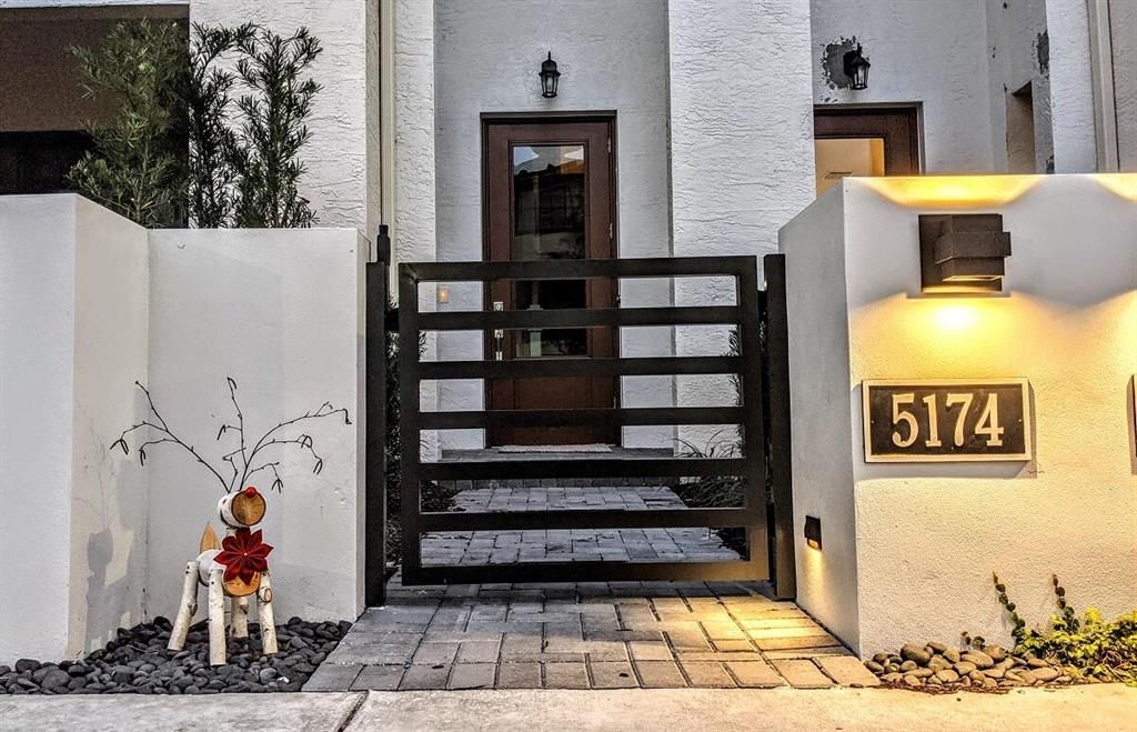 Photo of 5174 Beckman Terrace Ter, Palm Beach Gardens, FL 33418 (MLS # R10747746)