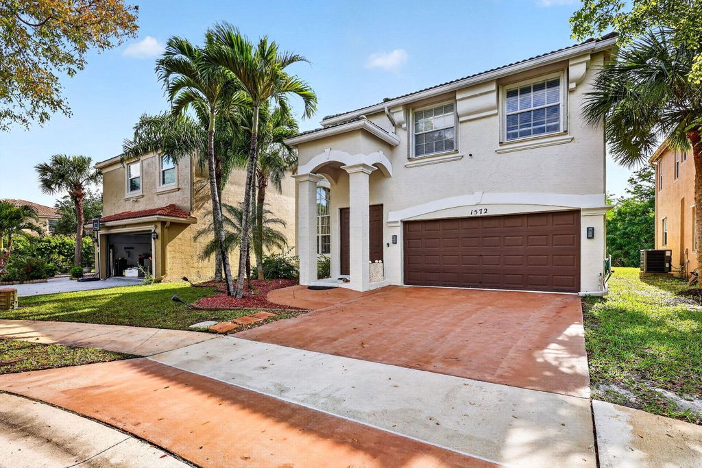 Photo of 1572 Briar Oak Drive, Royal Palm Beach, FL 33411 (MLS # B26017076)