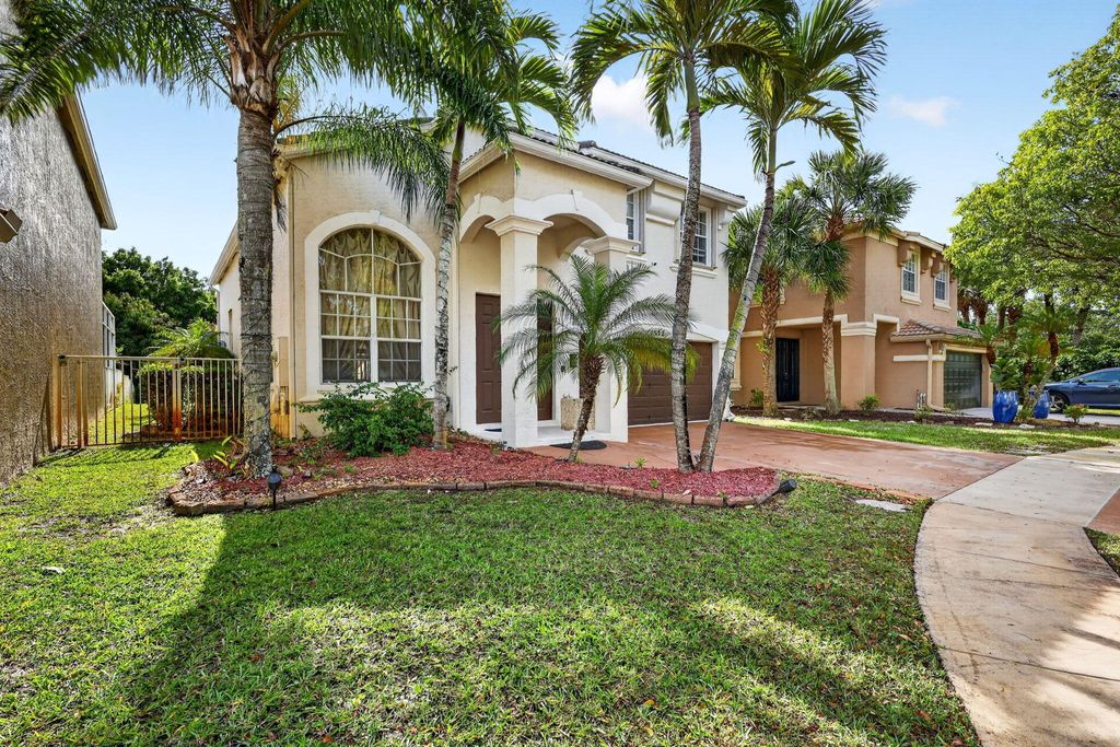 Photo of 1572 Briar Oak Drive, Royal Palm Beach, FL 33411 (MLS # B26017076)