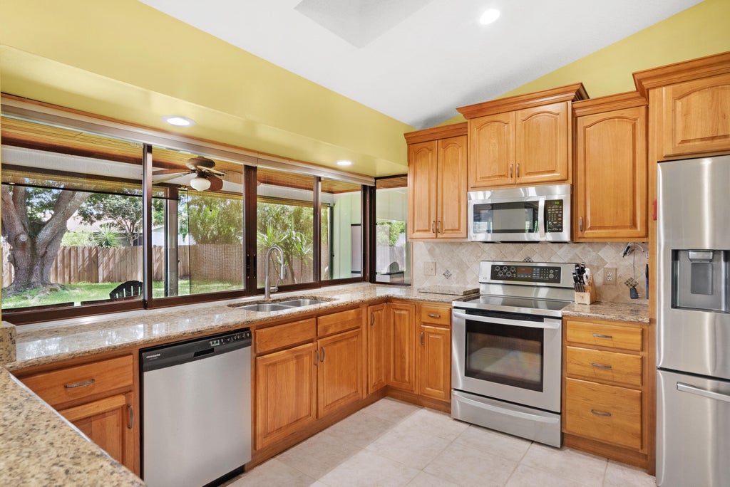 Photo of 412 SE Justine Terrace, Port Saint Lucie, FL 34983 (MLS # R11011822)