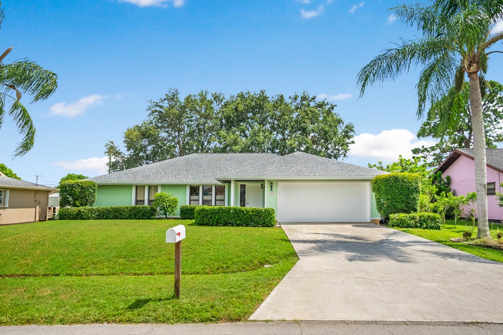 Photo of 412 SE Justine Terrace, Port Saint Lucie, FL 34983 (MLS # R11011822)