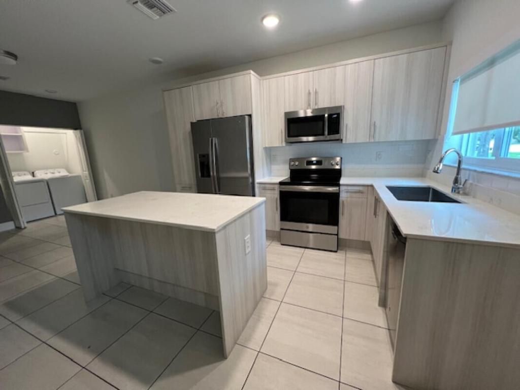 Photo of 3884 Melaleuca Lane #308, Lake Worth, FL 33461 (MLS # R11155929)