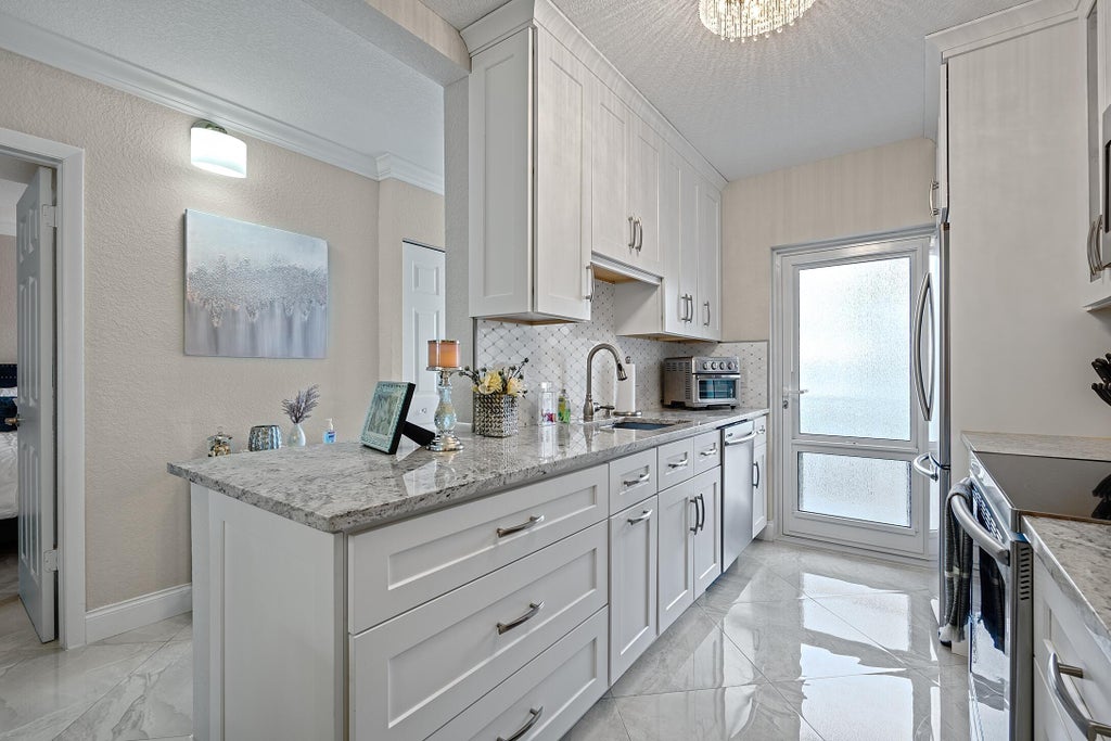 Photo of 1910 S Ocean Boulevard #204, Delray Beach, FL 33483 (MLS # B26069152)