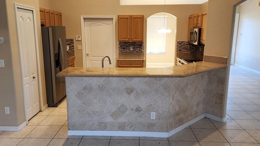 Photo of 3998 SW Bamberg Street, Port Saint Lucie, FL 34953 (MLS # R11116471)