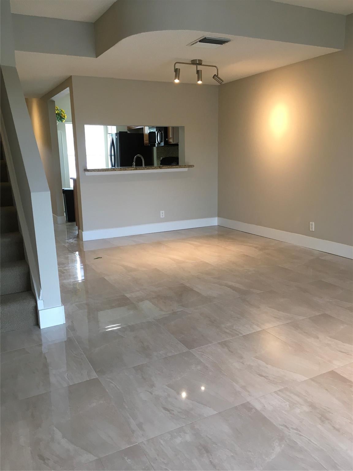 Welcome to this 2-bedroom, 2.5-bath townhome located in the sought-after Coconuts community, nestled within Weston's top-rated school district. Each bedroom features its own private en suite bathroom, offering comfort and privacy. Enjoy peaceful lake views and low HOA fees that cover lawn care, roof maintenance, and basic cable. Residents have access to the exceptional amenities at the Town Center Club at Bonaventure, including a gym, tennis courts, bowling, indoor basketball, racquetball courts, and a resort-style pool. Ideal as a starter home or investment property — no association approval required and can be rented immediately. Don’t miss this opportunity to own in one of Weston’s most desirable areas!