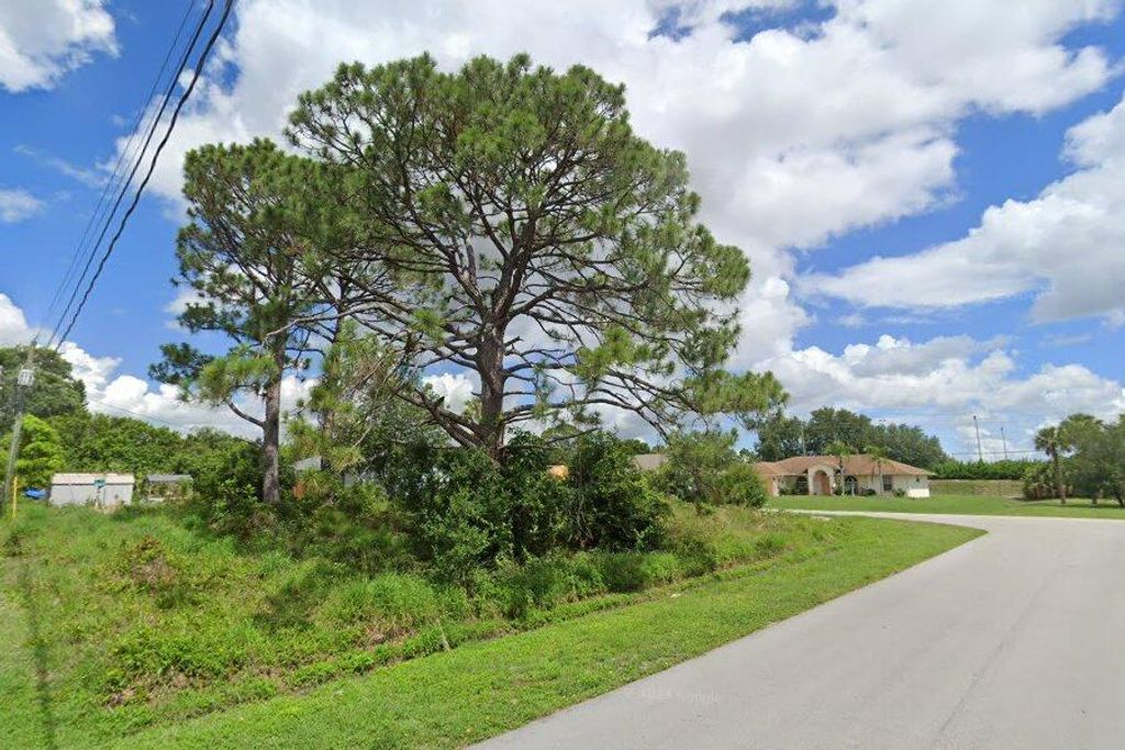 Photo of 1666 SW Althea Street, Port Saint Lucie, FL 34953 (MLS # R11138665)