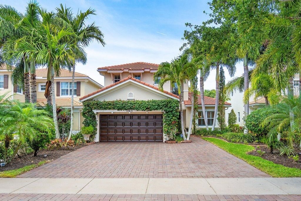 Photo of 12431 Aviles Circle, Palm Beach Gardens, FL 33418 (MLS # R10975455)