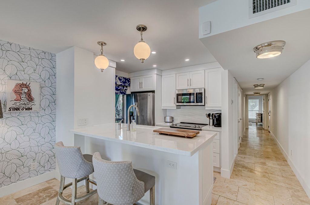 Photo of 296 Cypress Point Drive, Palm Beach Gardens, FL 33418 (MLS # R11108518)
