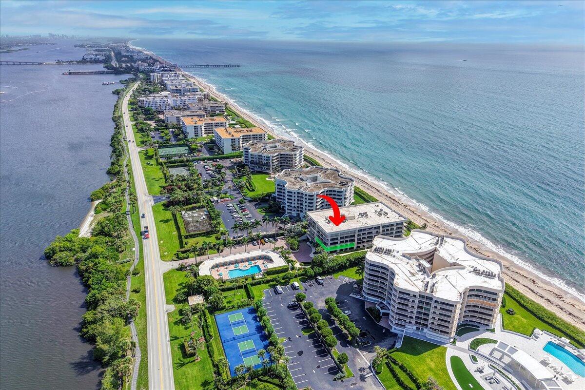 Welcome to your dream Palm Beach retreat! This elegant boutique condominium offers breathtaking, panoramic views of both the Atlantic Ocean and Intracoastal Waterway from every room. Step onto your private wrap-around balcony and watch the sunrise over the waves, or enjoy an evening breeze as the sun sets over the pool. Featuring 3 spacious bedrooms, 3 updated bathrooms, and an open concept living space with floor to ceiling windows, this home seamlessly blends luxury and comfort. The primary suite includes direct balcony access, an oversized walk-in closet, and an en-suite bathroom with all luxury finishes. This condo also comes with your own private, deeded 180 sq ft Pool Cabana which has been thoughtfully decorated with a coastal chic vibe, includes a full bathroom,