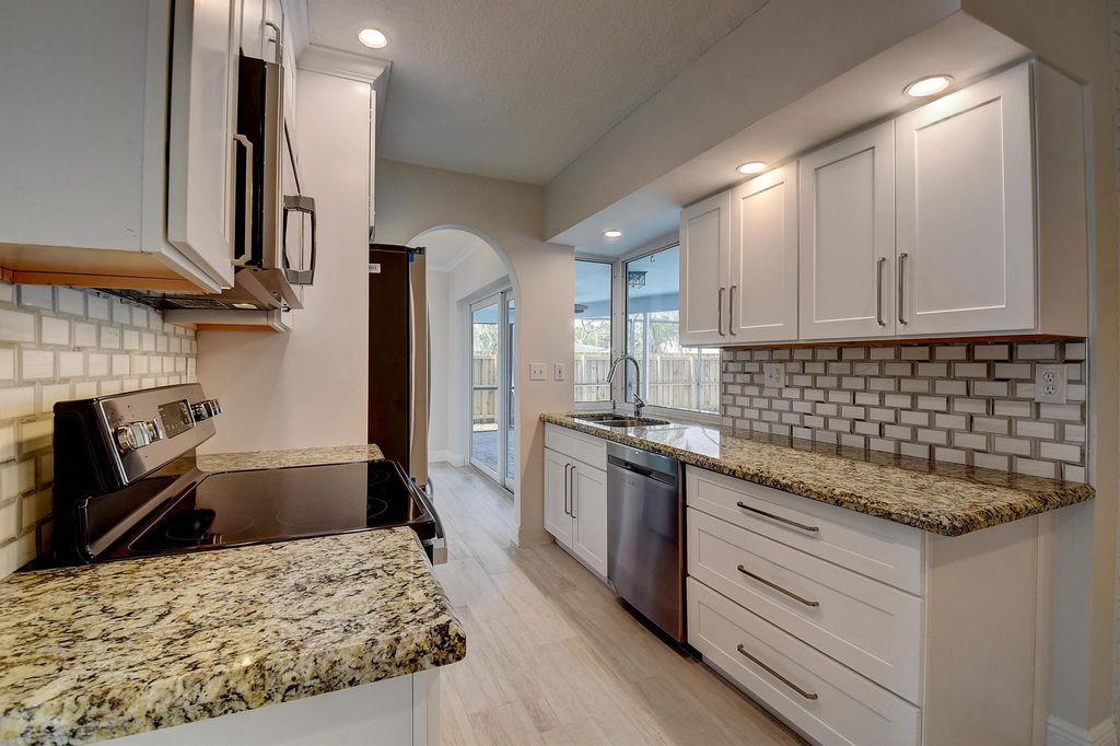 Photo of 1399 SW 11th Terrace, Boca Raton, FL 33486 (MLS # R11075039)