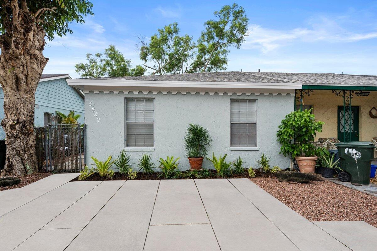 Welcome HOME!Welcome to this beautifully updated 3-bedroom, 2-bathroom townhome in the heart of Greenacres, Florida. Featuring a brand-new 2025 Dimensional shingle roof with 25 year life expectancy and newer A/C, this move-in-ready home offers peace of mind and stylish comfort. Inside, you'll find fresh interior and exterior paint, new luxury vinyl flooring throughout, and a completely remodeled kitchen with designer cabinetry, sleek countertops, and modern finishes. Both bathrooms have also been tastefully renovated with contemporary fixtures and designer touches. This townhome combines low-maintenance living with high-end upgrades-- NO HOA. Schedule your private showing today!