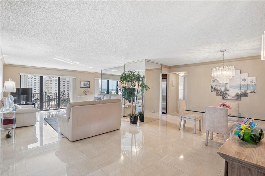 This condo has amazing views of the ocean and intracoastal. Exceptionally clean, new kitchen appliances, granite countertops and shiny marble floors in the living area. The bathrooms have been updated and are beautiful and functional. Come visit this pristine home. The Summit offers 24-hour security, cameras in common areas for your safety.  Many other amenities including 4 gyms saunas boccie ball courts, tennis and pickle ball courts. Also, there is bike storage a car wash area 2 swimming pools and a restaurant on the pool deck!!There are 2 parking spaces included with the sale also some furniture.