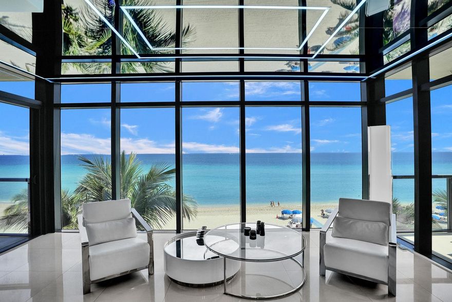 Step into this exclusive Oceanfront Penthouse in the luxurious boutique building, Sage Beach. Featuring its own large, spectacular rooftop terrace with a plunge pool, summer kitchen, and built-in BBQ—perfect for entertaining while enjoying stunning sunsets and ocean views, this penthouse offers the ultimate in coastal living. Enter through your private elevator to discover a sprawling 2,669 sq. ft. open floor plan. The unit features a spacious oceanfront master suite, two generous bedrooms with en-suite bathrooms, three balconies, a chef’s kitchen with top-tier appliances, custom finishes, a home theater projector, and more. The building offers a fitness center, heated saltwater pool, and private beach access. The unit comes with two parking spaces.