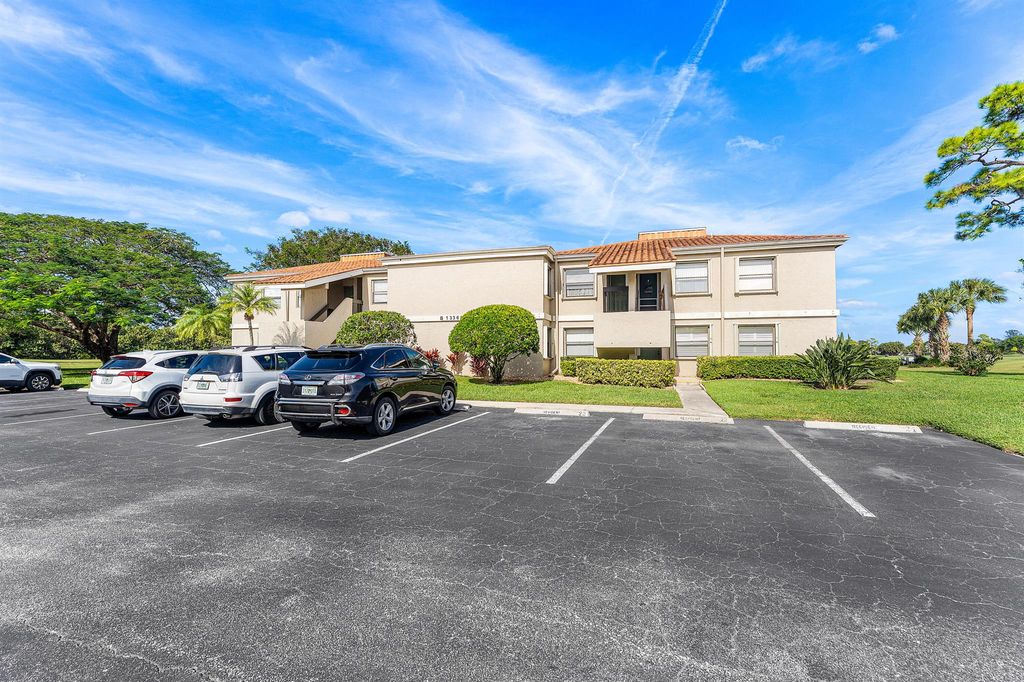 Photo of 13369 Touchstone Place #102, Palm Beach Gardens, FL 33418 (MLS # R11145955)