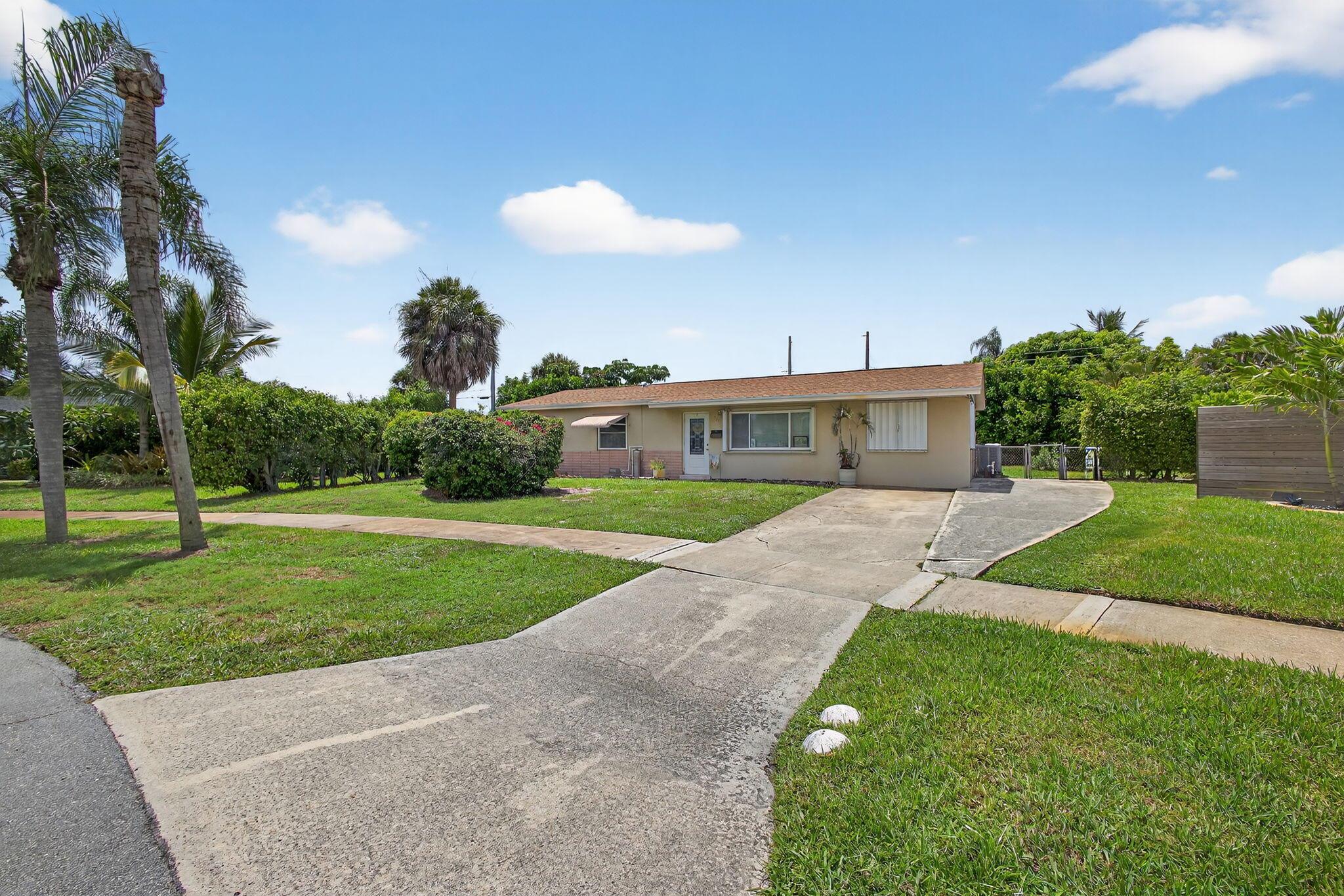 Welcome to this charming 4-bedroom, 2-bath home located in the highly sought-after Village of North Palm Beach (33408). With a newer roof (2023) & no HOA, this home offers endless potential to make it your own. Featuring generous square footage (.28 acres), a very large fenced yard, & an ideal location with amazing parks and great school district. Nestled in a golf cart-friendly neighborhood, residents also enjoy access to the public North Palm Beach Country Club, featuring a Jack Nicklaus-designed golf course, tennis club, Olympic-size swimming pool, & NPB marina for large yachts. With nearby dining, coffee shops, pizza, BBQ, & entertainment at The Gardens Promenade, this location has it all.