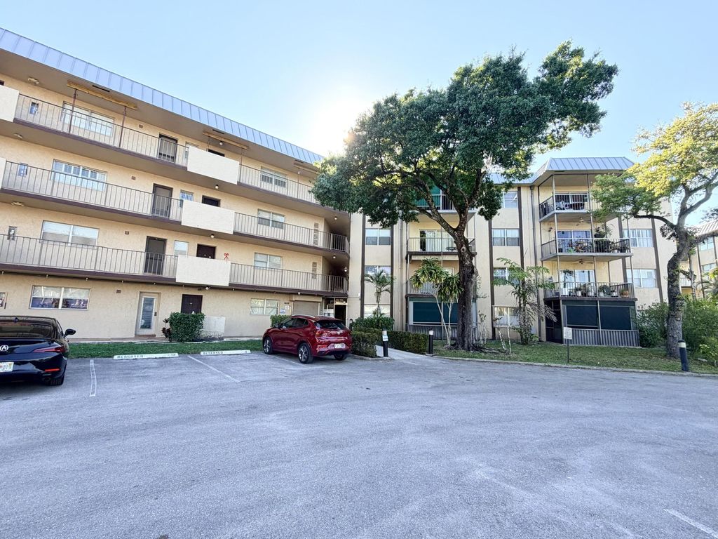 Photo of 6260 S Falls Cir Drive #201, Lauderhill, FL 33319 (MLS # B26007830)