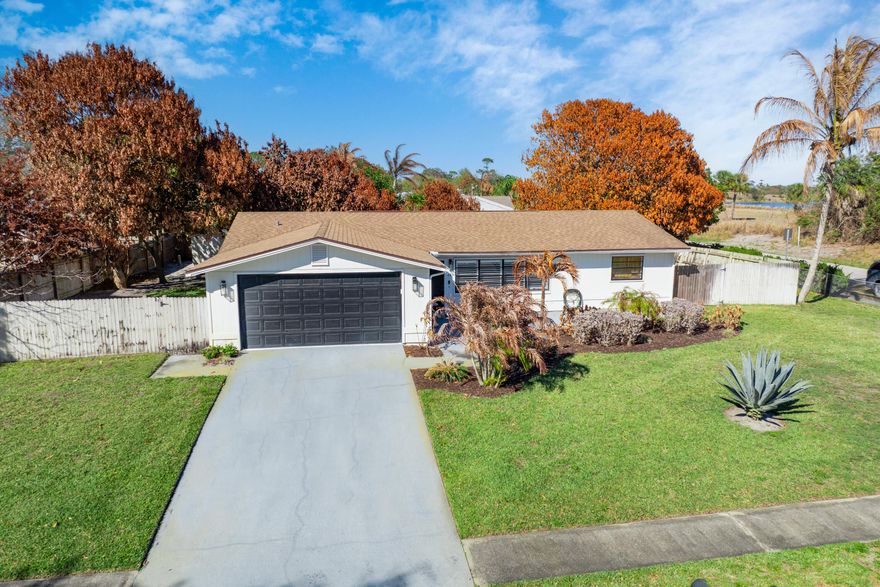 This beautifully updated home is nestled on a corner lot with NO HOA! The interior has been refreshed with new paint, fixtures, and luxury vinyl flooring. Brand-new appliances and a new washer and dryer add everyday convenience. Relax in a lush, fenced yard with mature fruit trees in a peaceful setting. The garage has been upgraded with a freshly sealed floor. A move-in-ready home with room for your toys and space to grow. All measurements are approximate. Take a look at the 3D walkthrough. Some images have been digitally enhanced for illustrative purposes.